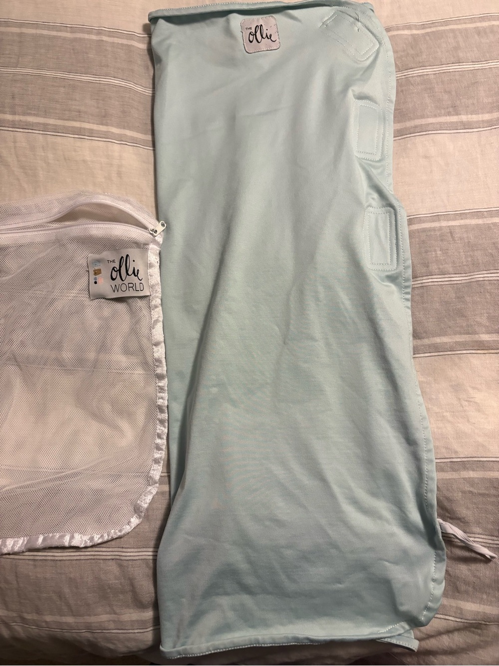 The Ollie Swaddle in Sky blue with Laundry Bag, Used Condition